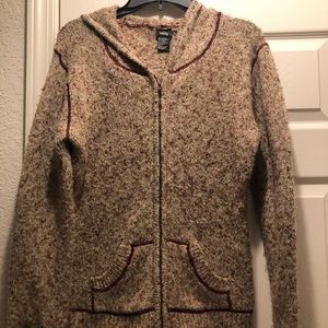 Multi Color Sweater that has a hood and zips with cute pockets. Great Condition
